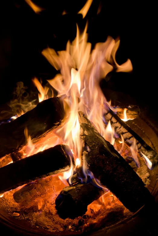 the fire is blazing in a large, open flame