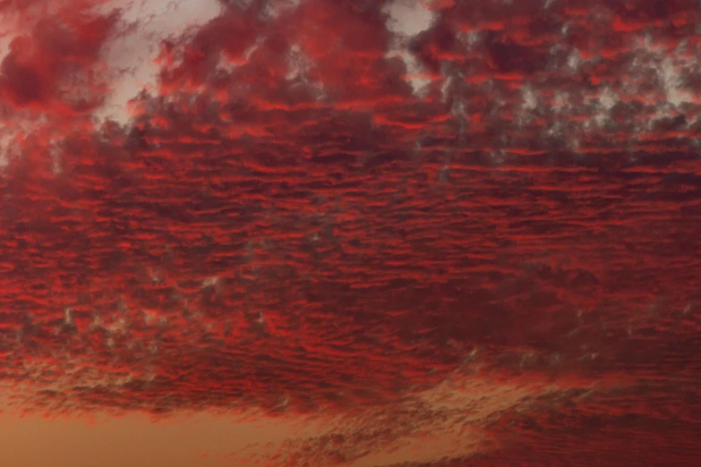 clouds are covering the sky over a town