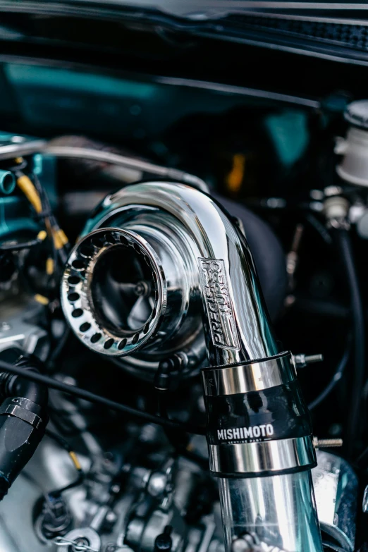 the front end of a motorcycle showing the rotors and engine