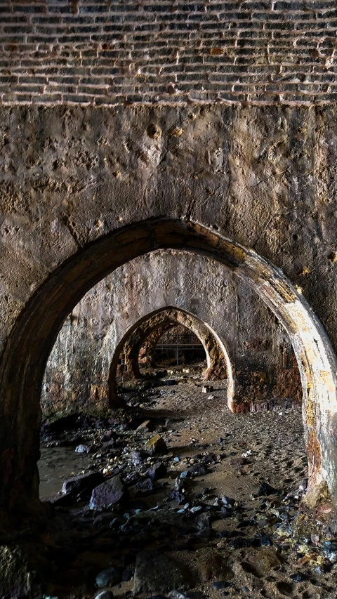 a small well is standing in the mud