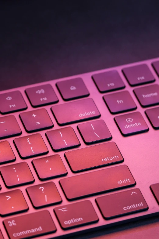 the top of the pink keyboard has arrows