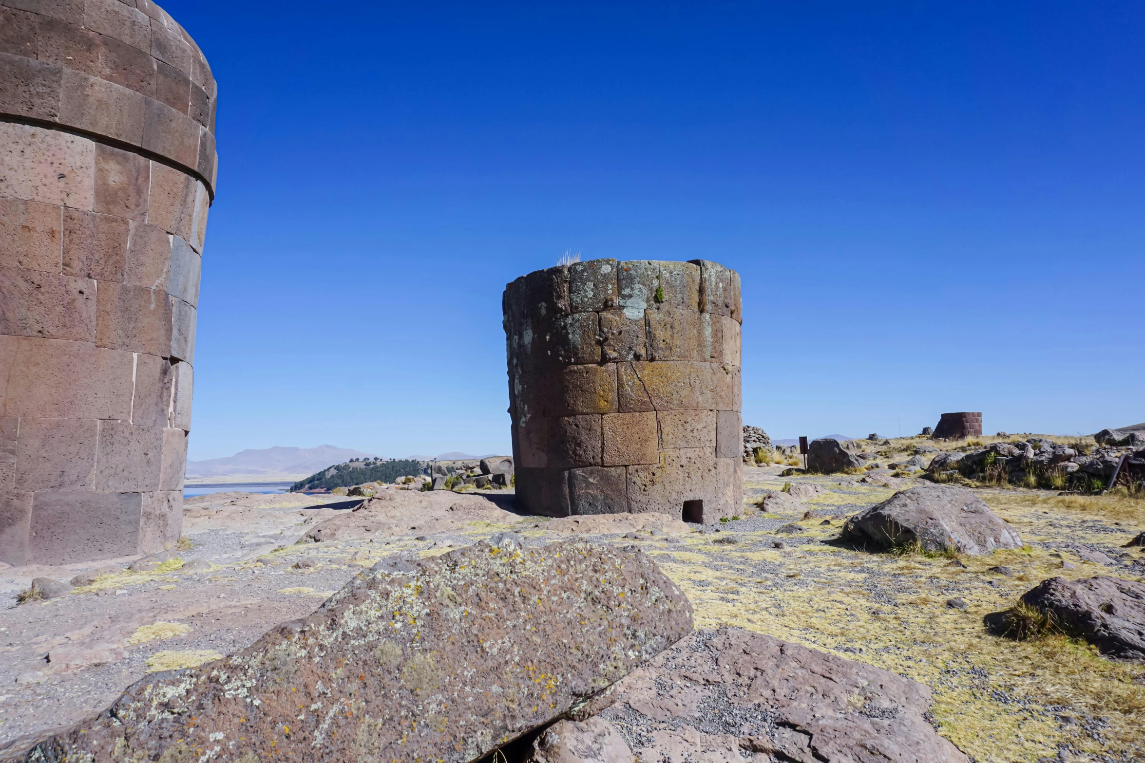 an old tower on top of some rocks