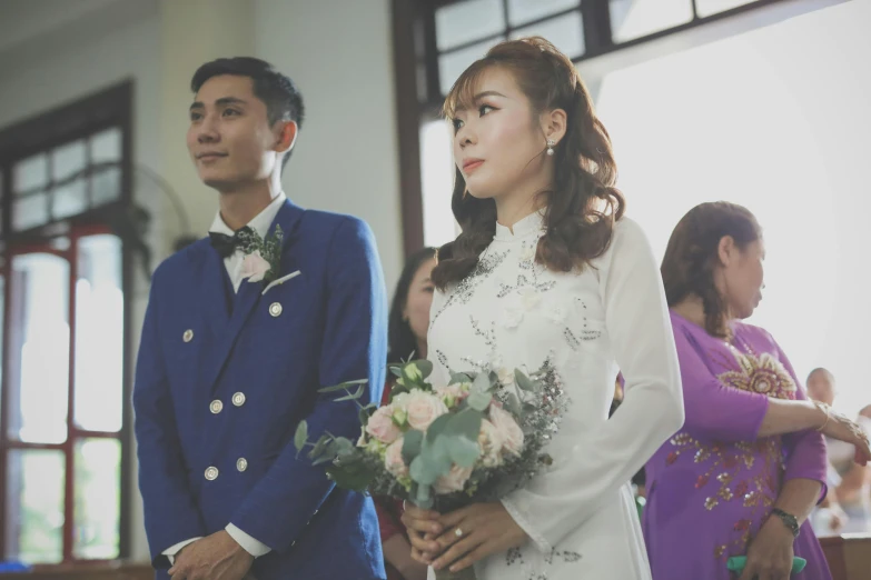 the young bride is walking down the aisle at the ceremony