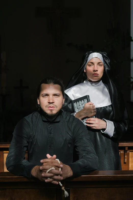 two people with headscarves on standing next to each other