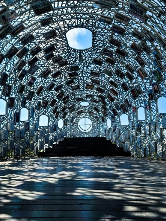 the inside of a structure with a long table on it