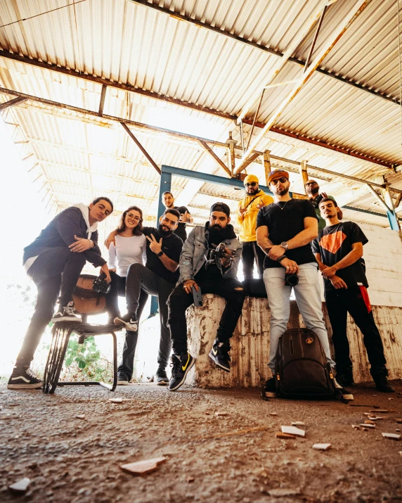 people standing in an old building with an acoustic microphone