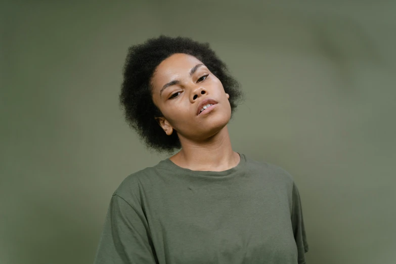 a close up of a person with an afro