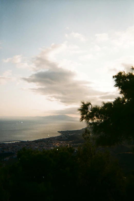 the view of a large body of water and clouds