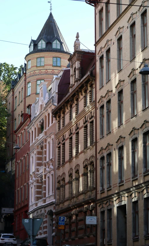 many old buildings line the street in the city