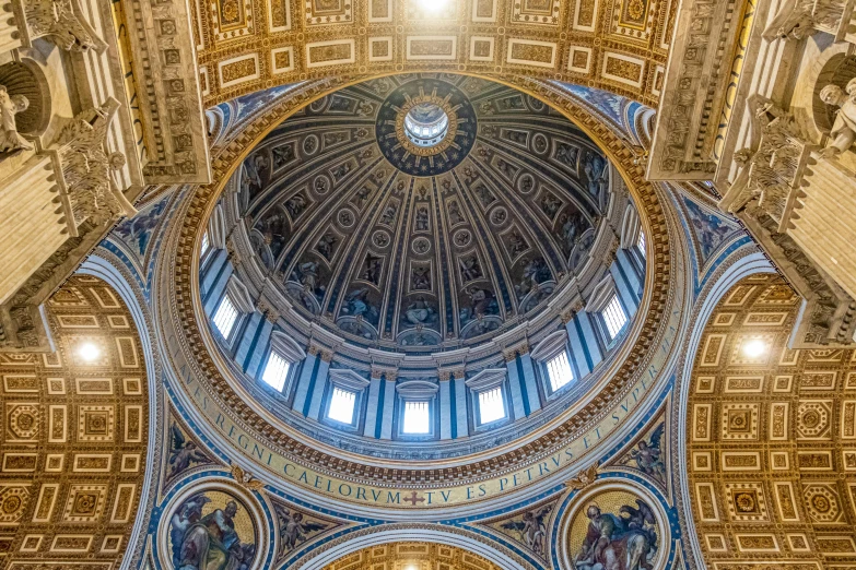 a dome with an intricate mural in a building