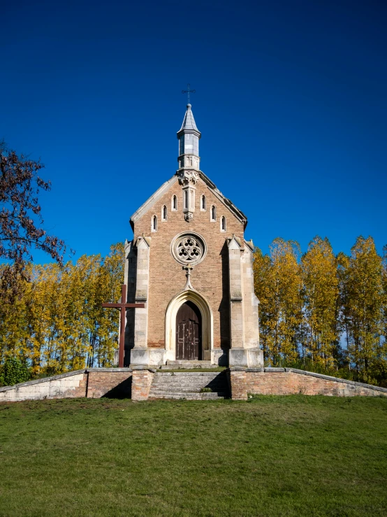 a church sits empty in the shade of blue skies