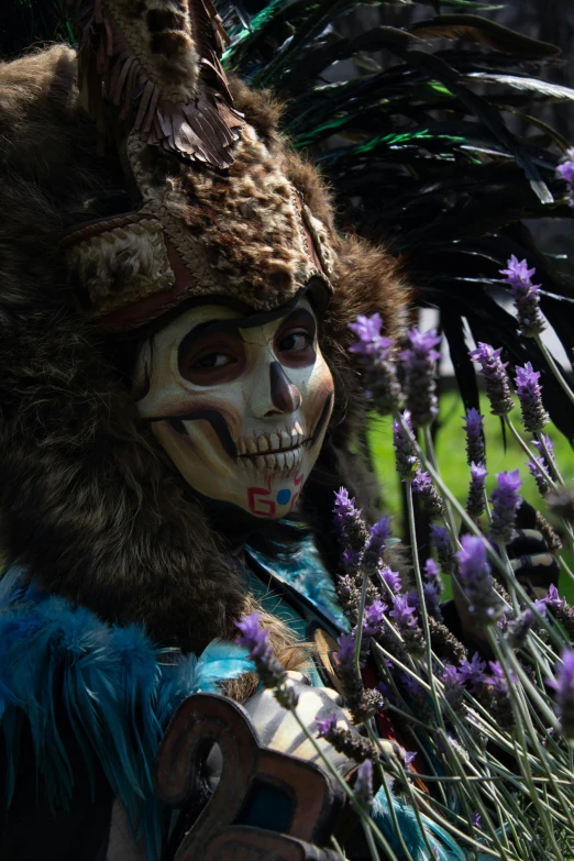 a skeleton is dressed up in native american costume