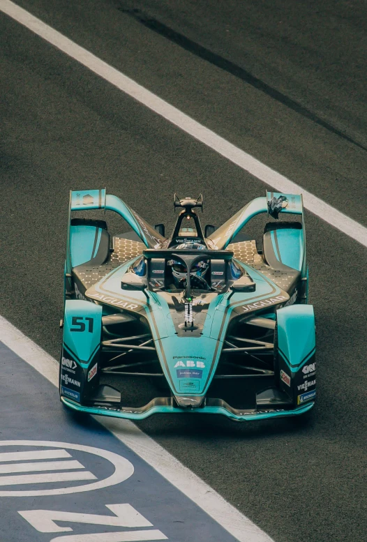 a close - up of a race car moving down the road