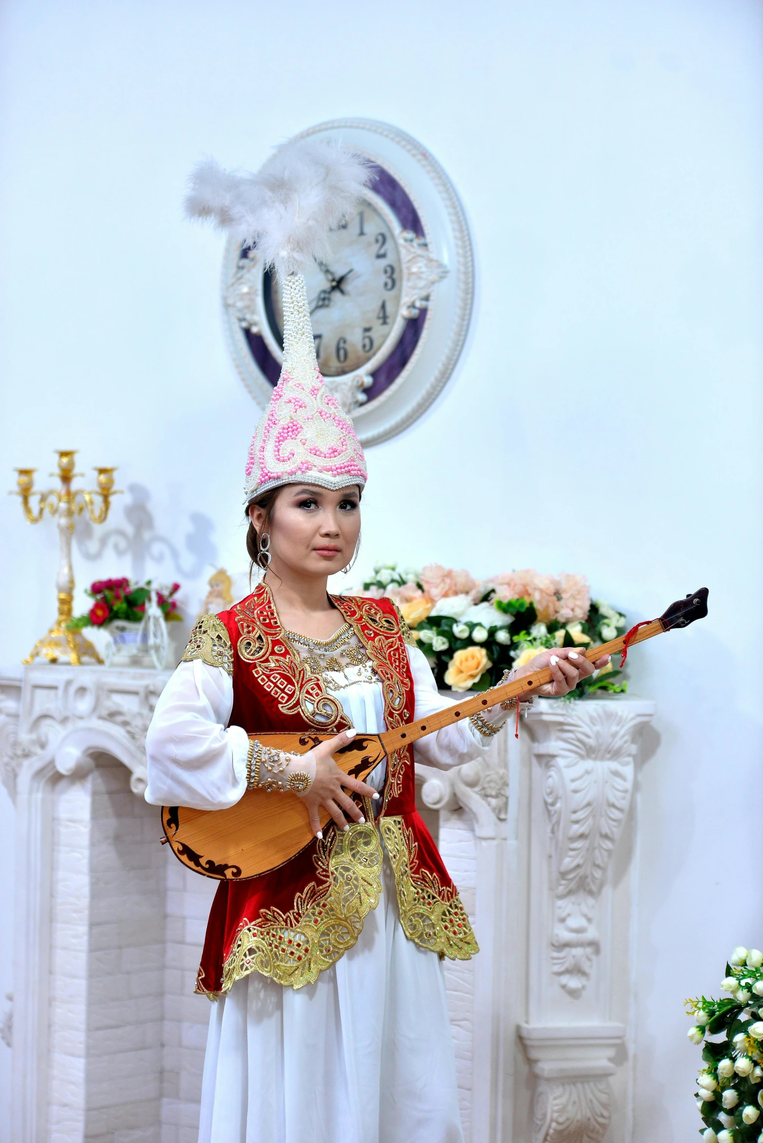  in a persian outfit playing the guitar