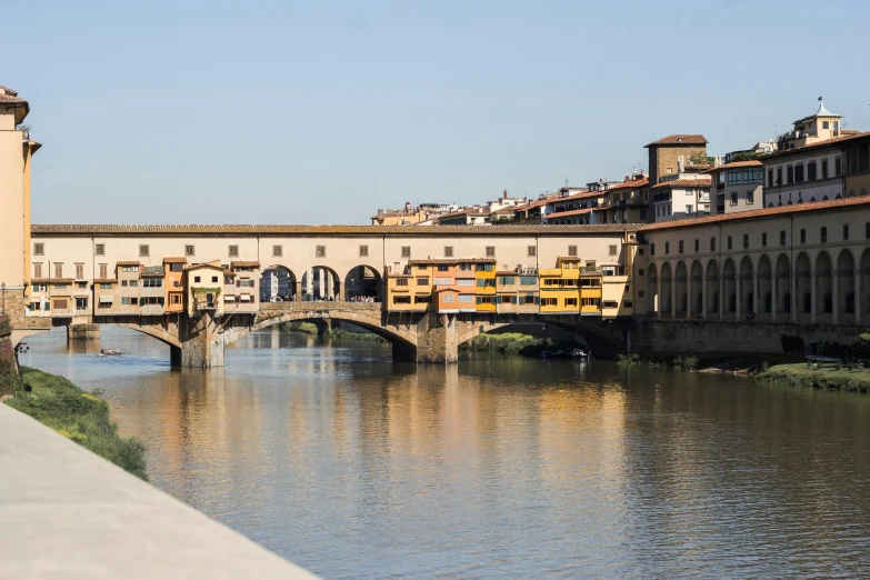 a river running through a small town with lots of buildings on it