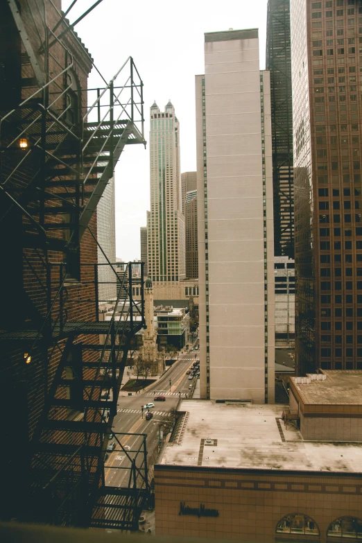 a city has tall buildings and a fire escape