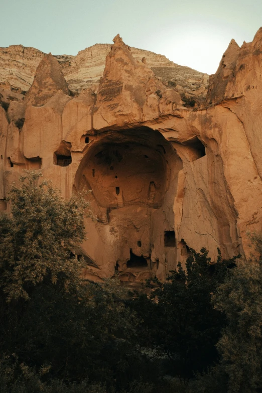 a view of an underground structure in the side of the mountain