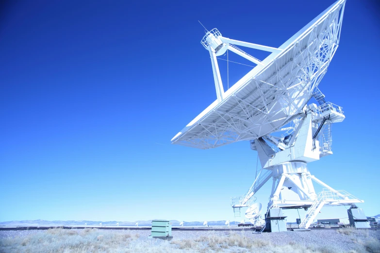 an artistic image of the space telescope at an area near a field