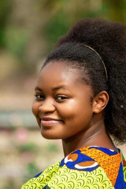 this little girl has an afro in her hair