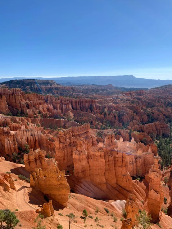 the landscape features rocky mountains and rocks