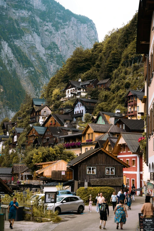 an old town with mountains and buildings near by