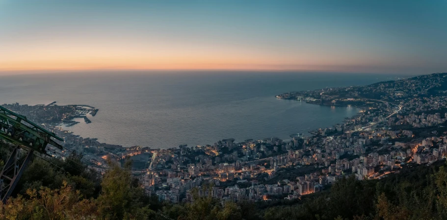 the view of a mountain town in the evening