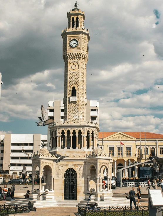 a building with a very tall clock on the side of it