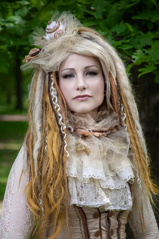 a woman with long hair with two bangs and a floral crown