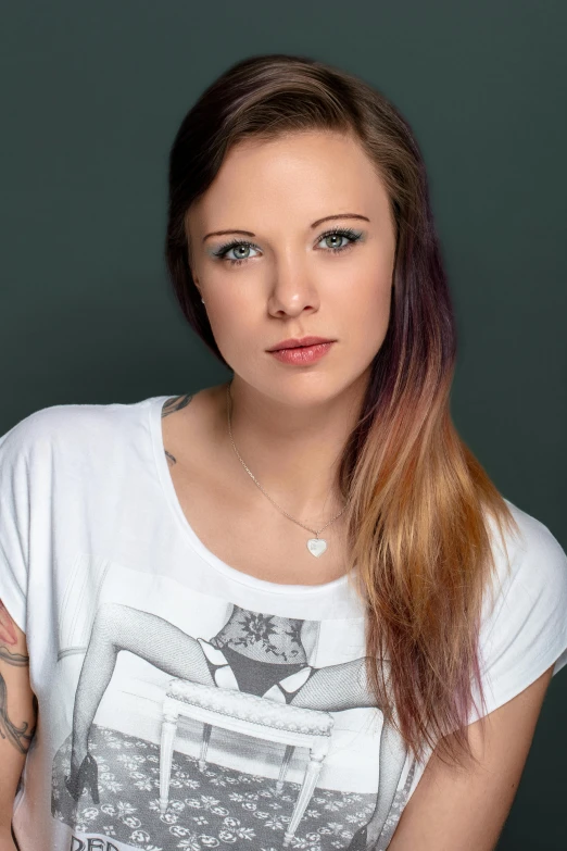 a young woman with long hair and a necklace