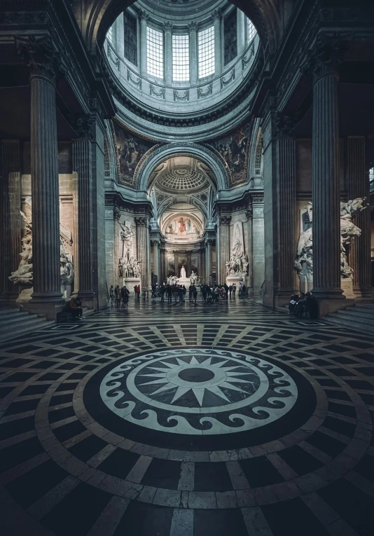 a group of people sitting inside of a building