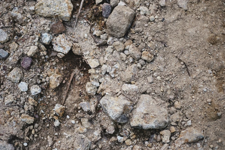 the dirt is covered with rocks and gravel