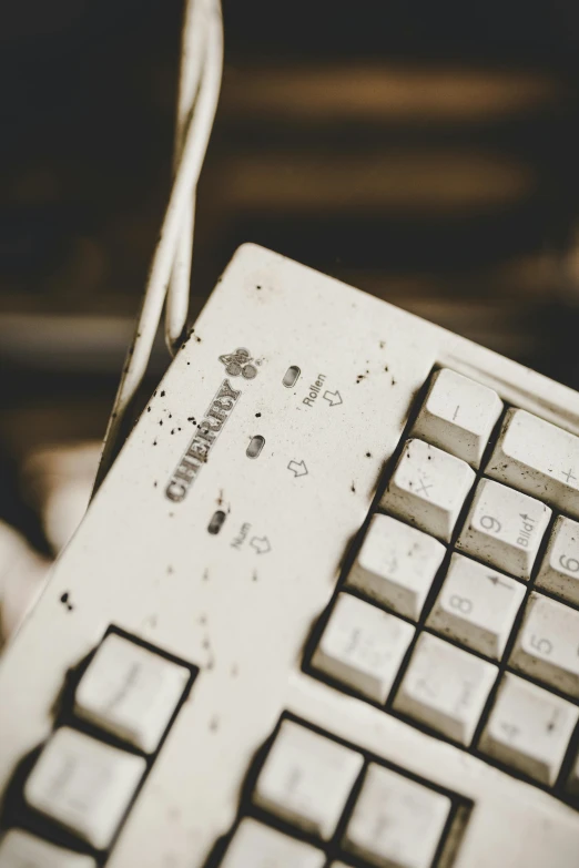 an old computer keyboard with some old written on it