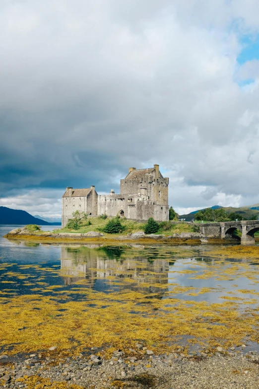 a castle sits in an abandoned part of the isle