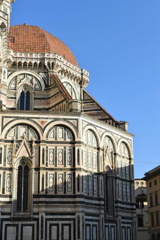 a large building with a massive steeple and dome