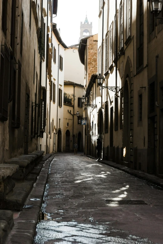 an alleyway of a building in an old city