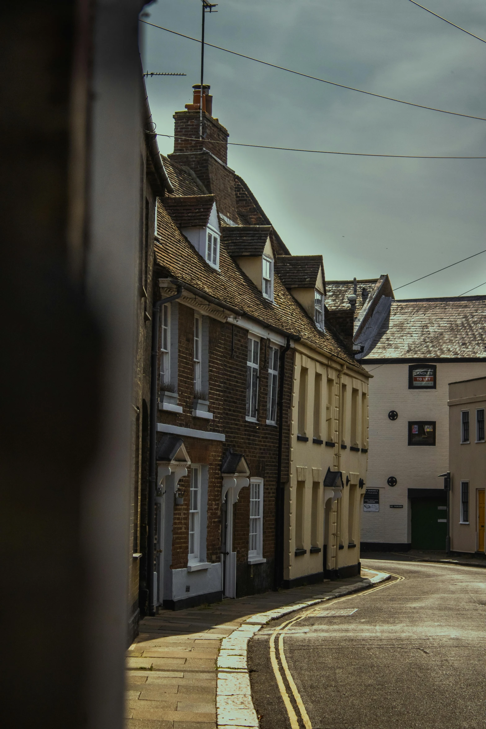 the street in the city has cobblestones