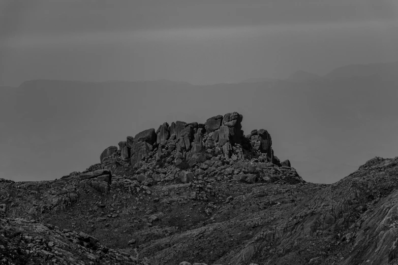 mountains are shown with a dark sky and no clouds