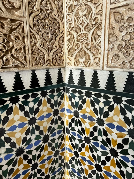 decorative art work on the wall in an oriental building