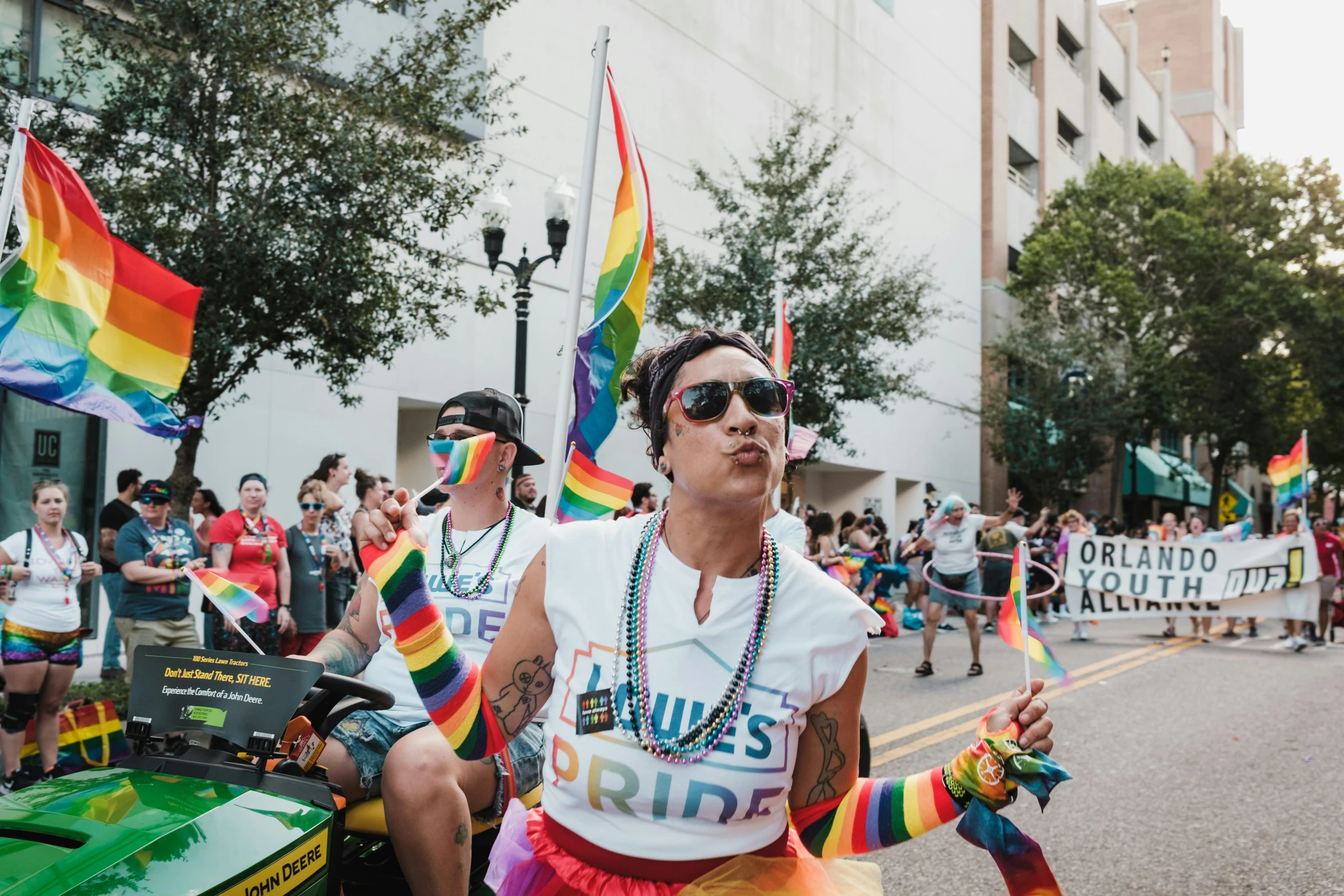 a large group of people at an pride parade