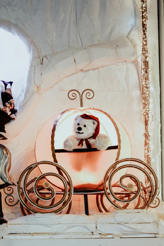 the teddy bear is posed as if it was going through a mirror