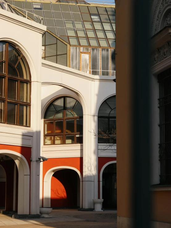 the inside of an old building with arched doorways