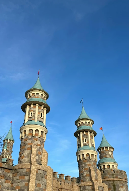 two stone towers in front of a sky background