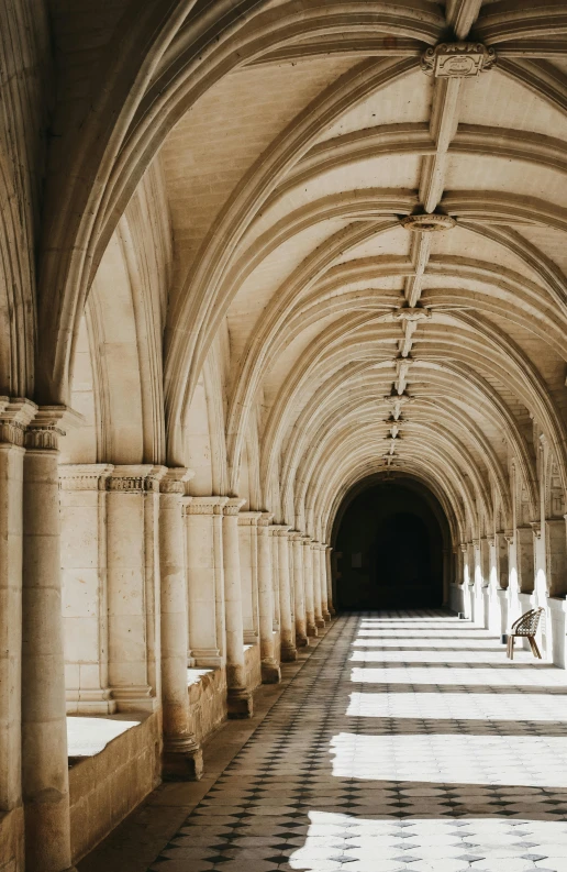 an empty and unreale hallway with many pillars