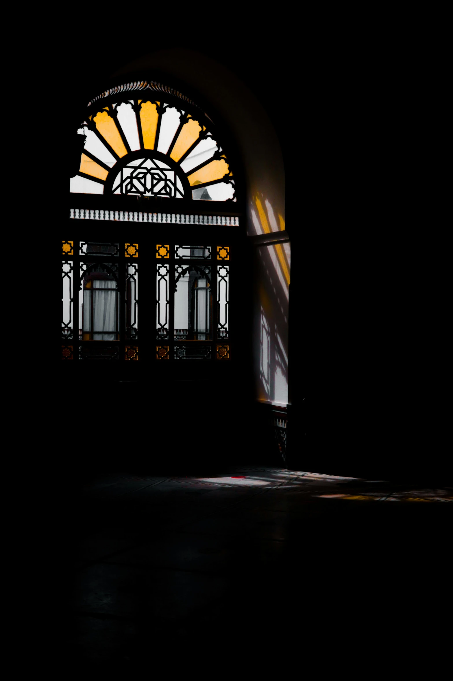 a window that has stained glass over it