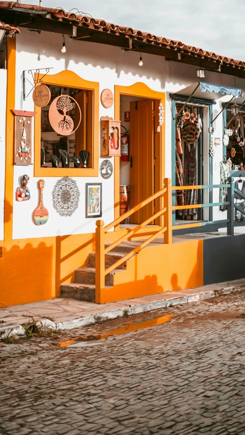 a store that is painted bright orange and white
