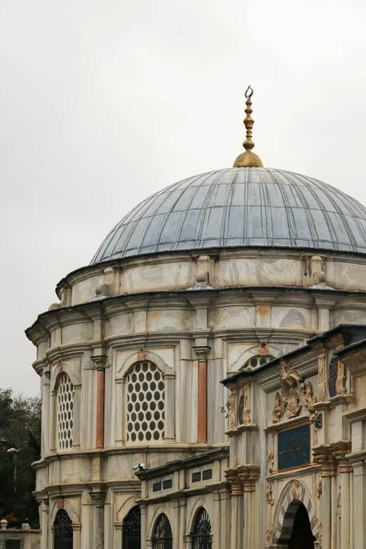 the dome on top of this building features a clock