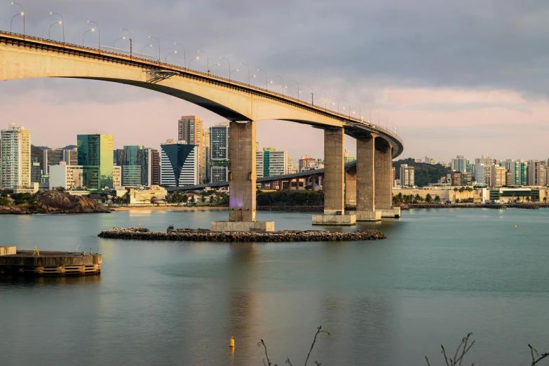 a long bridge spanning over a large body of water