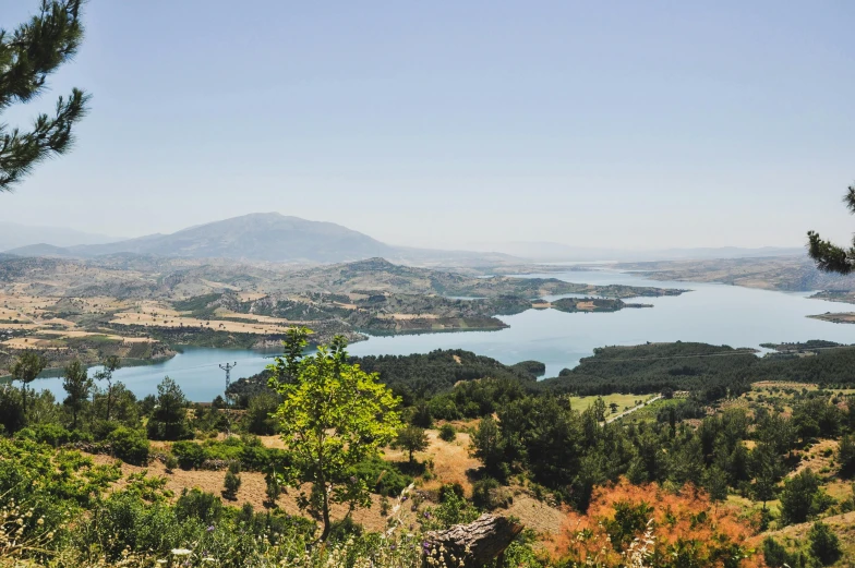 view over landscape, including mountain and lake in daytime