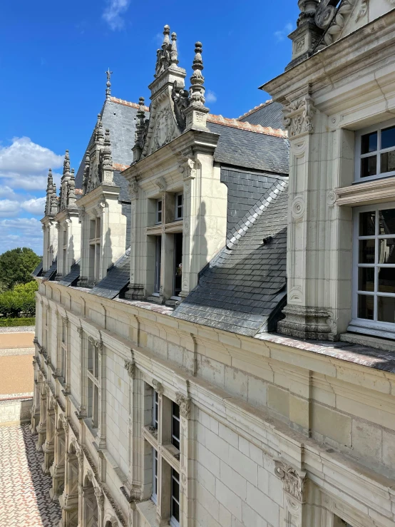 a view of the back side of a building that looks old