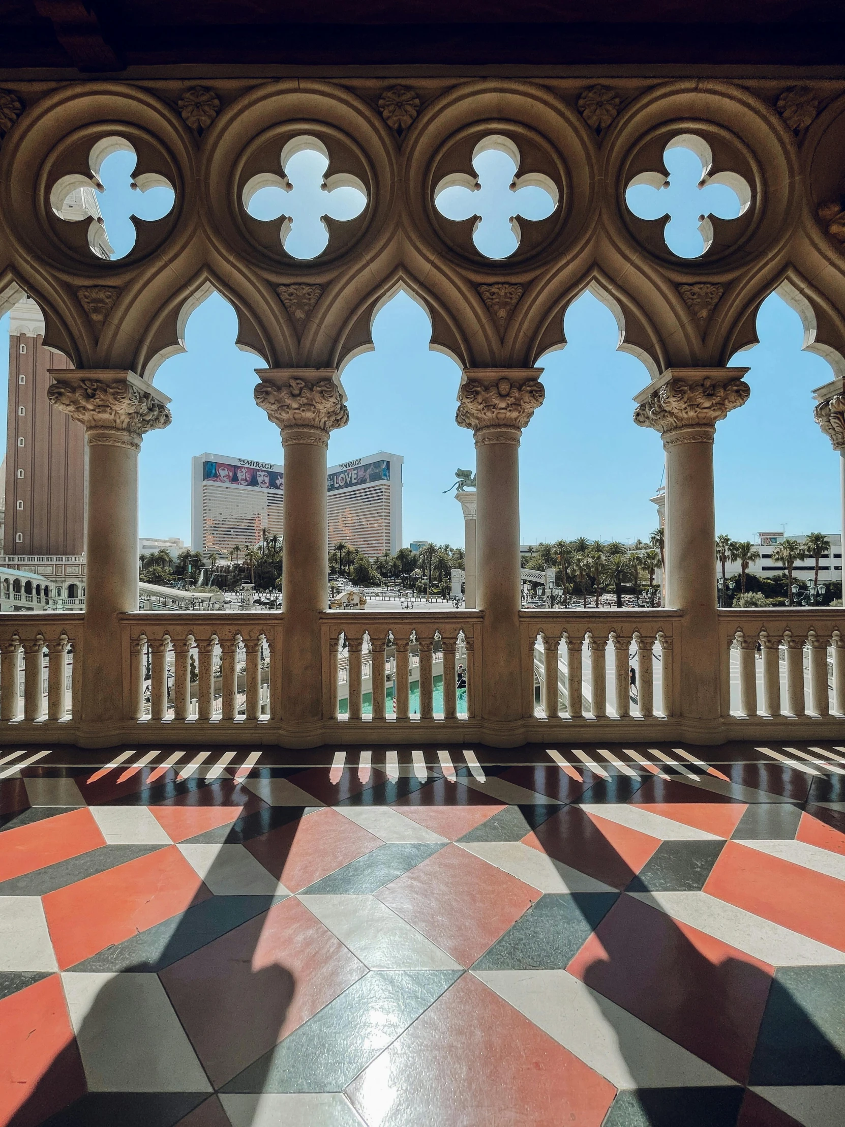 a large floor with a fancy wall with a bunch of windows on it